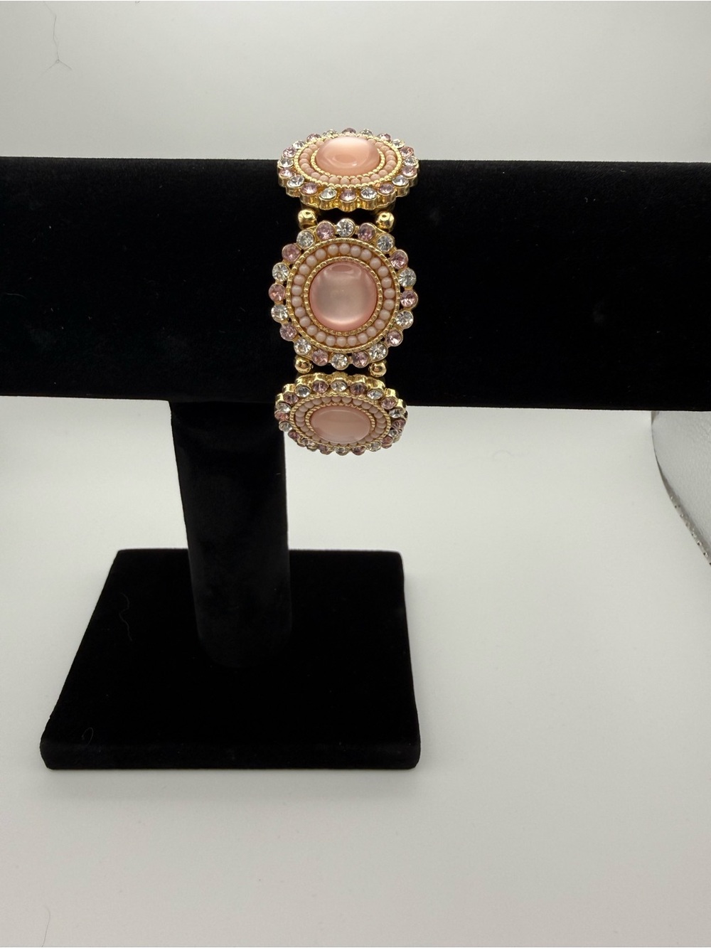 Charming Charlie Gold-Tone Bracelet with Pink Cabochons and Crystal Accents
